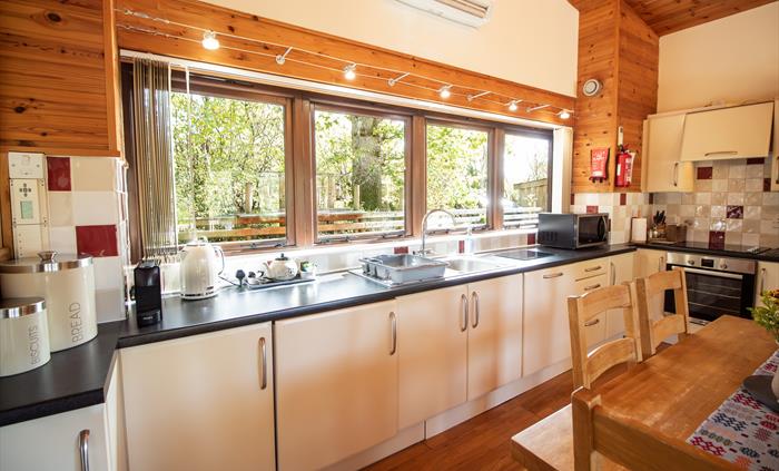Fully equipped kitchen with built in appliances.